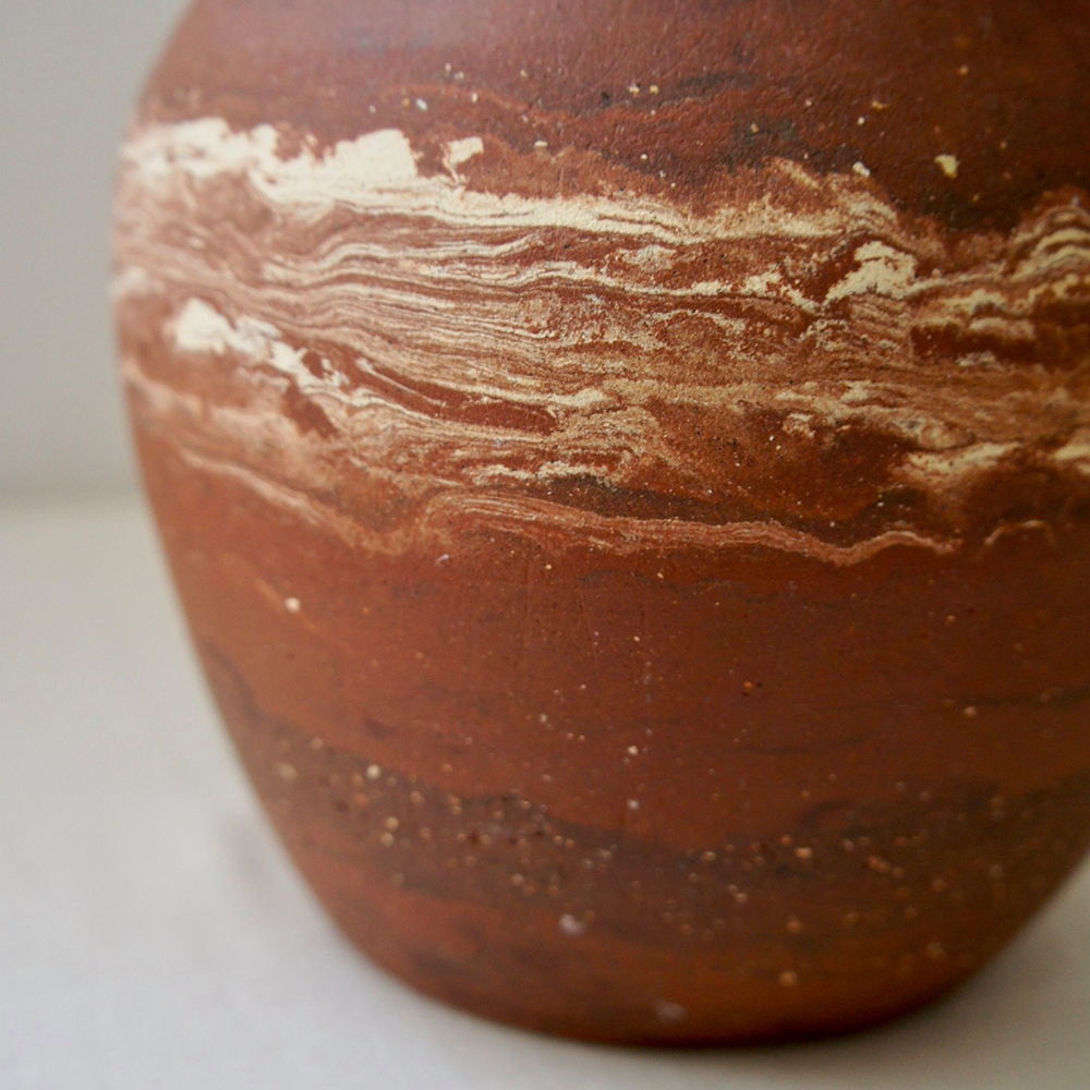 Jupiter By Alina Aradhana, Photo Of Clay Vase Partly